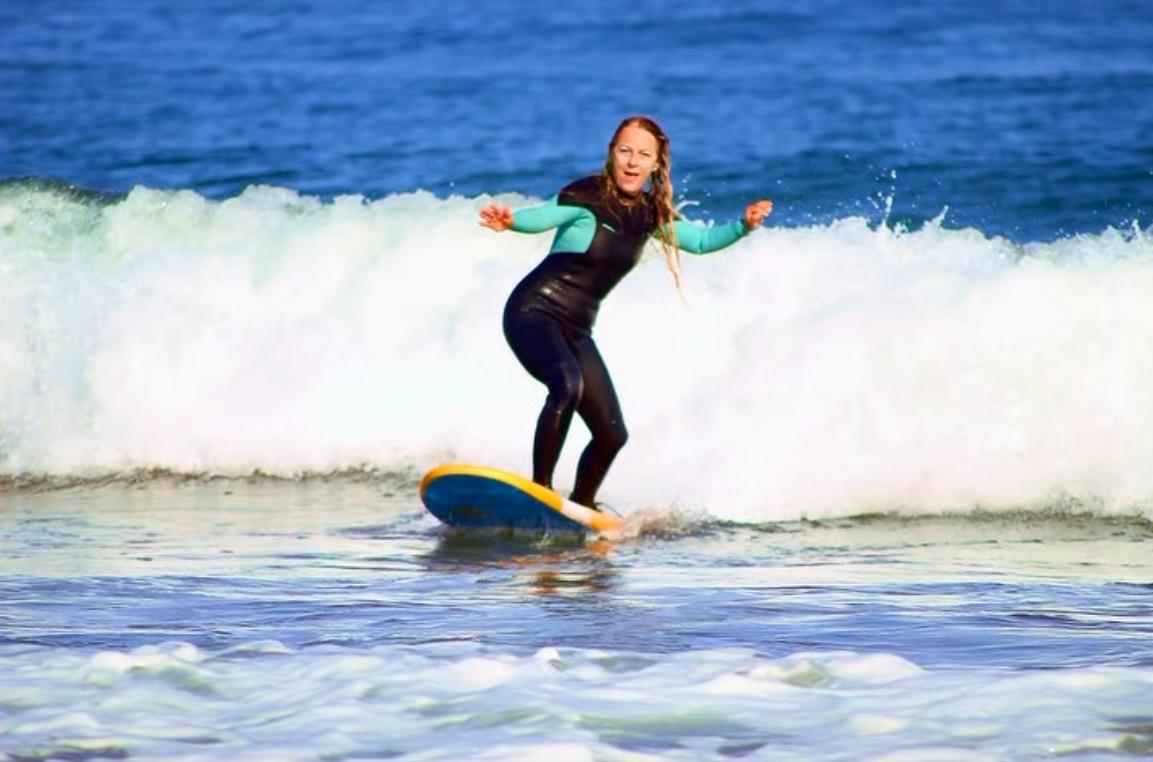 Guest surfing a wave